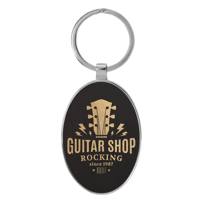 Black/Gold Lasered Leatherette/Metal Oval Keychain