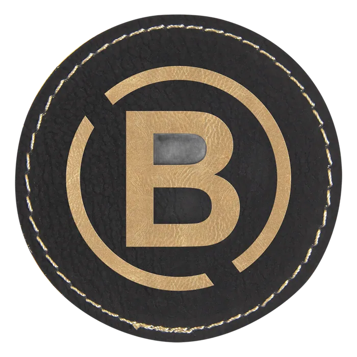 Round Black/Gold Laserable Leatherette Patch with Adhesive, 2 1/2"