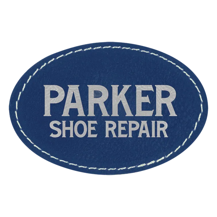 Oval Blue/Silver Laserable Leatherette Patch with Adhesive