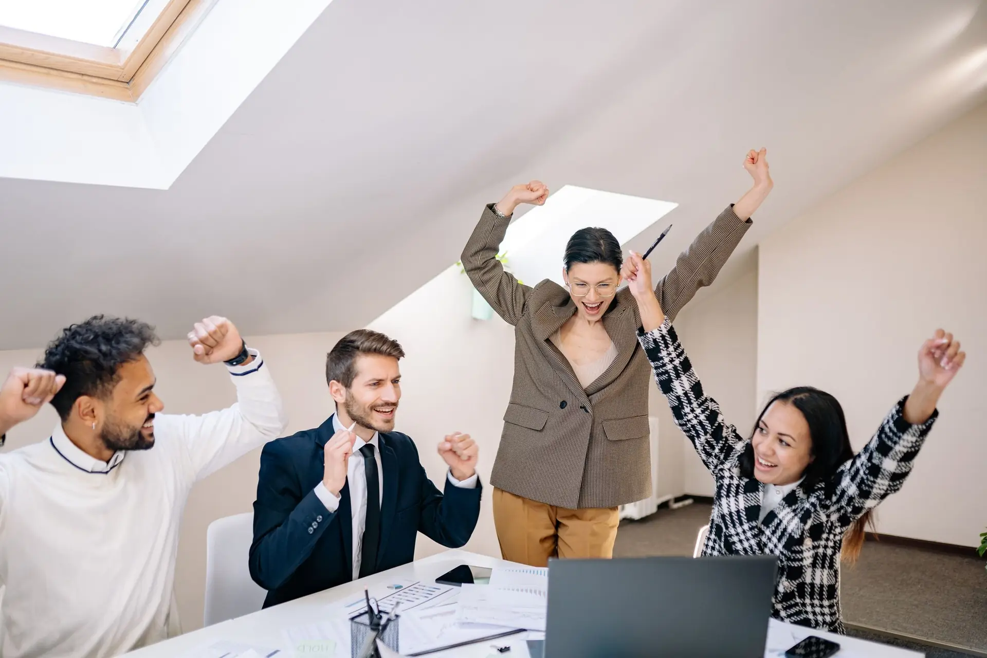 Office team celebrating a win